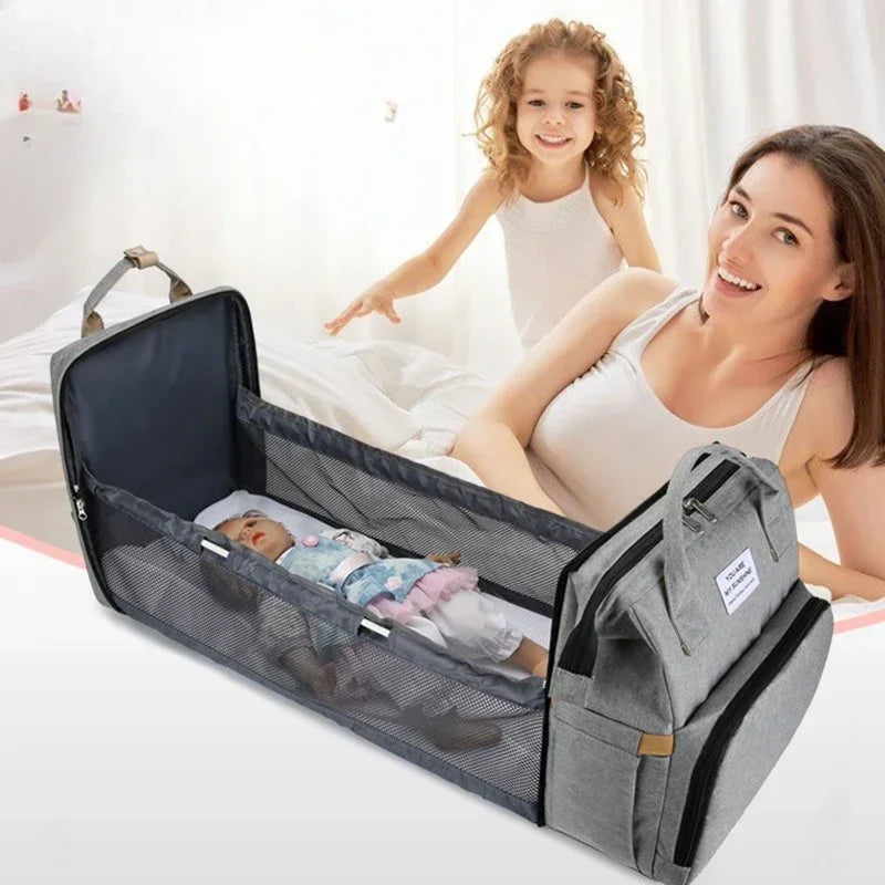 Practical Baby Sling Backpack with Integrated Bassinet - Luxicro