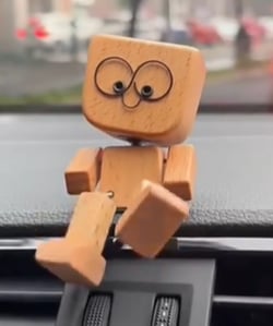 Unique Wooden Rocking Toy with Interchangeable Faces