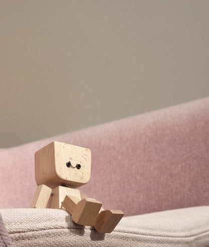 Unique Wooden Rocking Toy with Interchangeable Faces