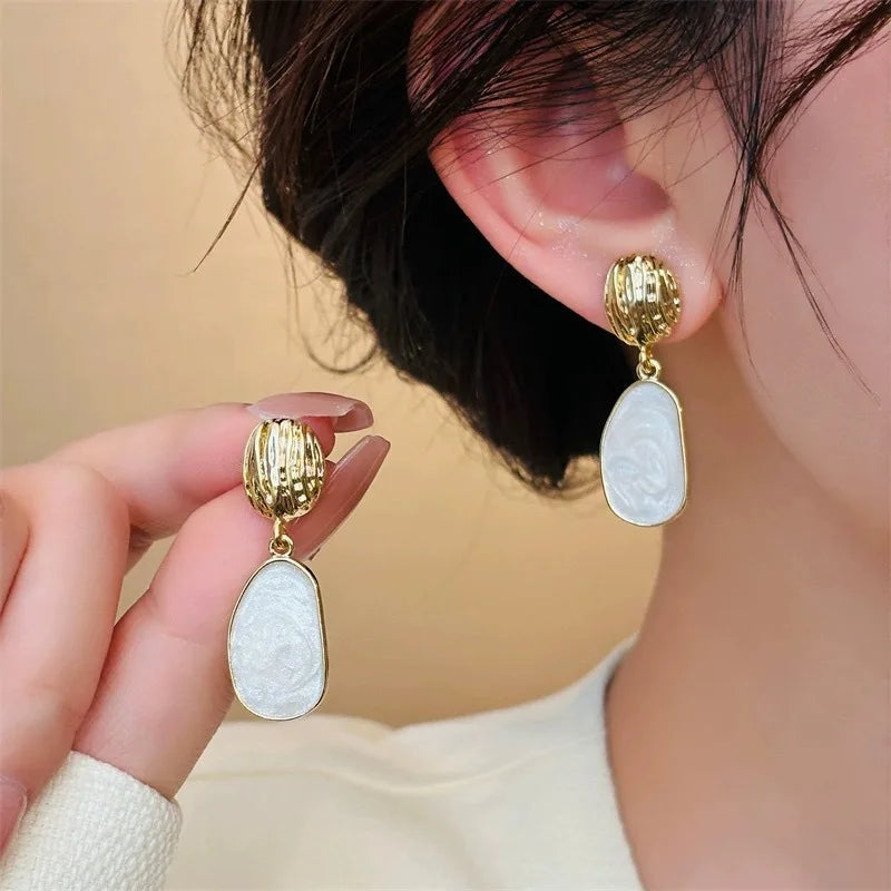 Elegant Golden Dangle Earrings - Luxicro