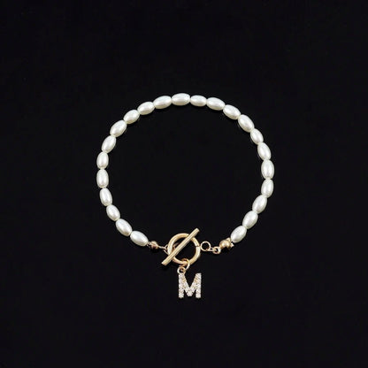 Luxurious Initial Pearl Beaded Charm Bracelet