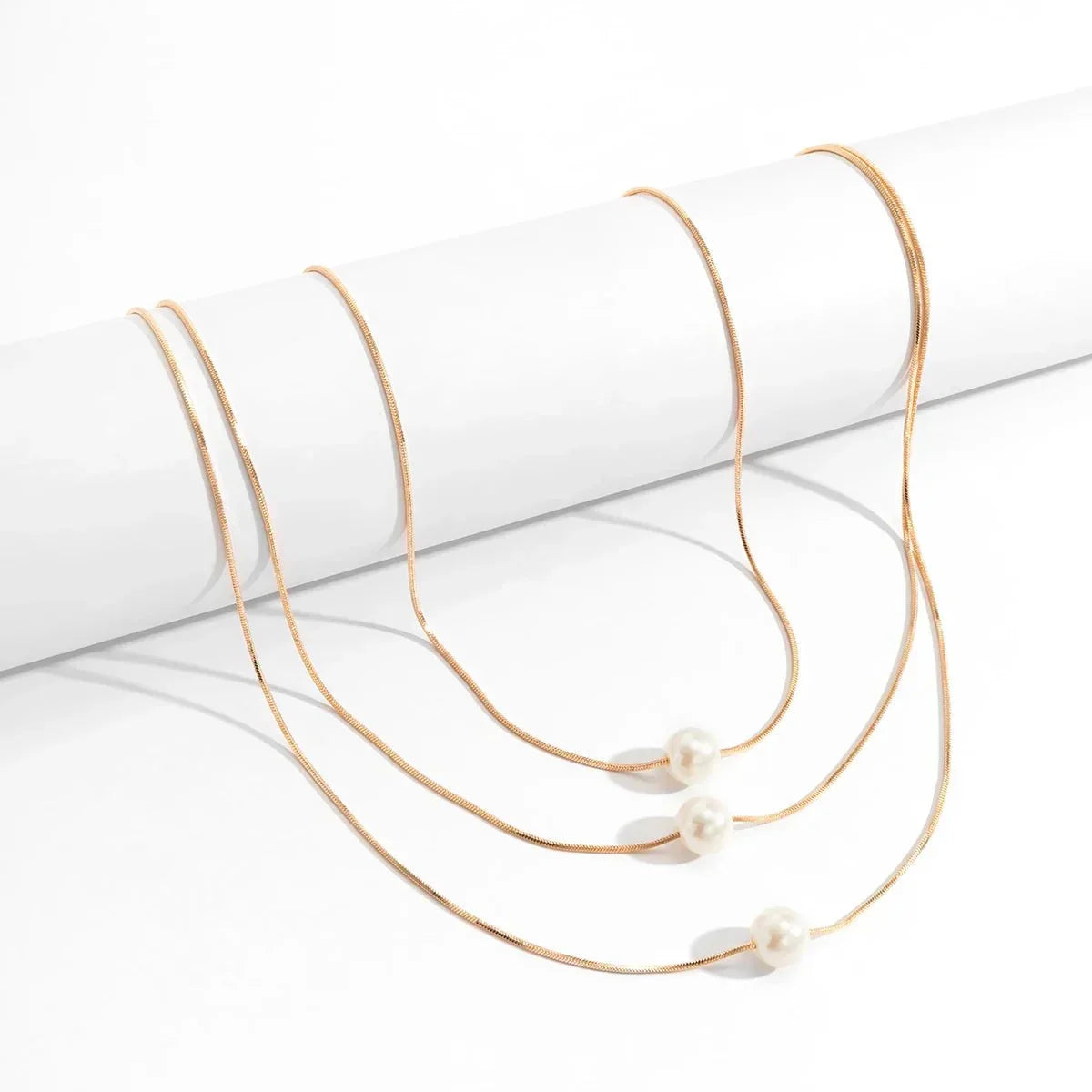 Elegant Triple Strand Pearl Necklace