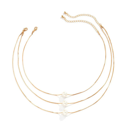 Elegant Triple Strand Pearl Necklace