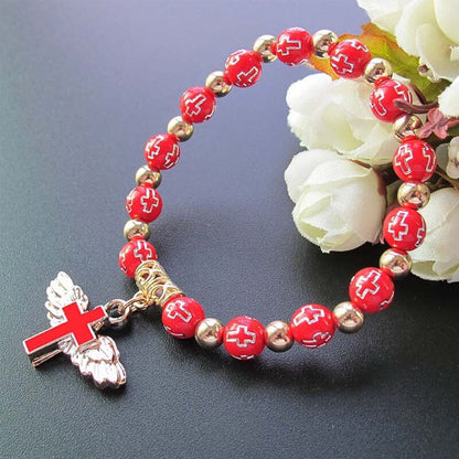 Delicate Wing Cross Charm Bracelet